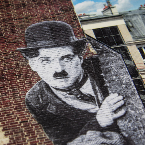 Unframed Charlie Chaplin revu par JR, The Kid, Charlie Chaplin & Jackie Coogan, USA, 1923, de jour Paris, 2021